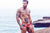 Male model with tattoos wearing 2EROS Swim Briefs for Men
