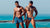 Two male models on a beach wearing 2EROS swimwear available at MensUnderwear.io
