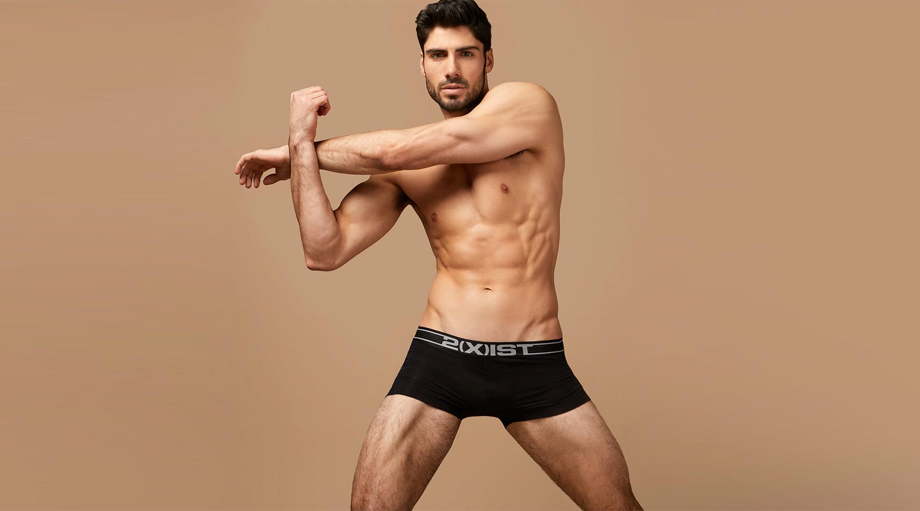 Male underwear model wearing 2XIST Trunk Underwear available at MensUnderwear.io