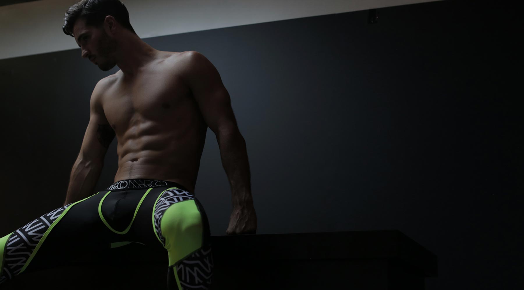 Male model wearing Marco Marco leggings for men available at MensUnderwear.io