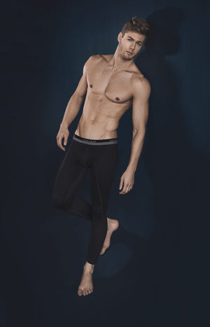 Male underwear model wearing Clever Underwear Reaction Athletic Pants available at MensUnderwear.io