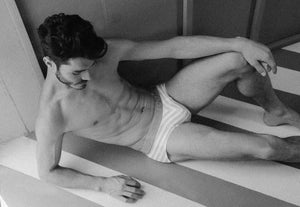 Male underwear model wearing Mundo Unico Entertain Briefs available at MensUnderwear.io